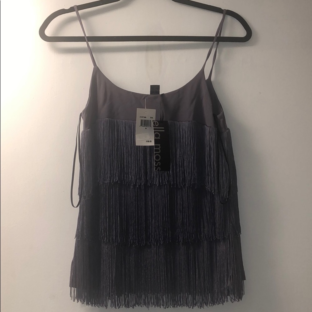 Strapped Too with fringes.